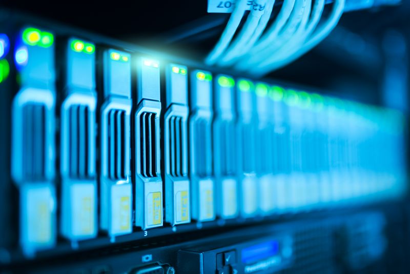 Detailed image of a server rack with glowing lights in a modern data center